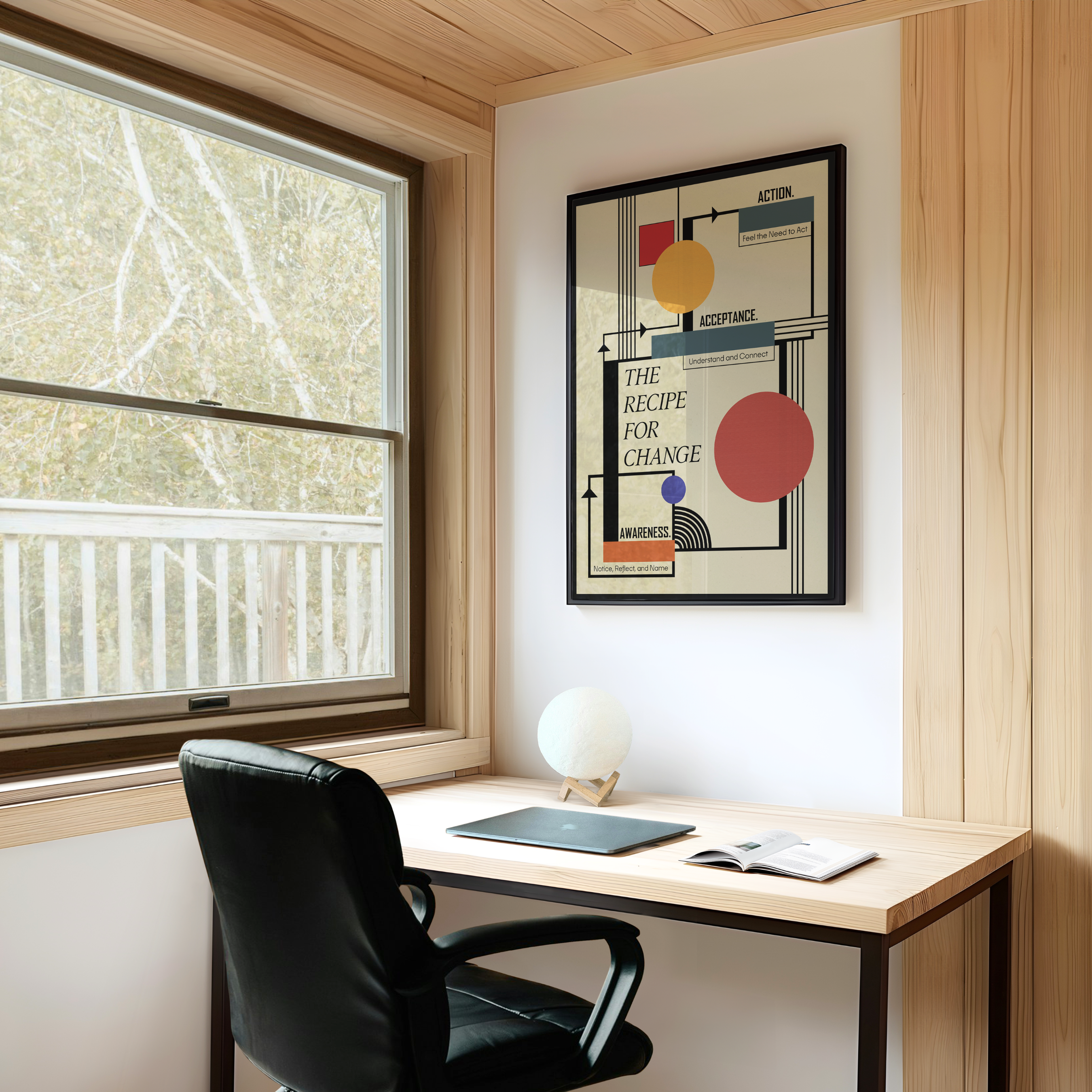 A framed Bauhaus-inspired healing art print with the quote "The Recipe for Change" hangs above a wooden desk in a modern home office. A contemporary geometric wall art piece for therapy office decor, counseling spaces, and mindful interiors.